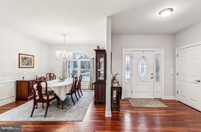 922 Central Ave, Hammonton, NJ 08037 - entryway with a chandelier, dark wood-type flooring, and wainscoting