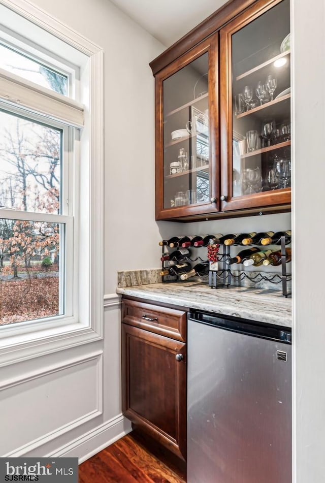 922 Central Ave, Hammonton, NJ 08037 - indoor dry bar featuring fridge and dark wood-style floors