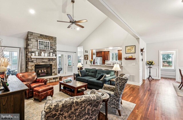 922 Central Ave, Hammonton, NJ 08037 - living area featuring wood finished floors, ceiling fan, high vaulted ceiling, a stone fireplace, and beam ceiling