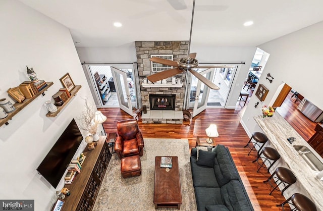 922 Central Ave, Hammonton, NJ 08037 - living area featuring ceiling fan, wood finished floors, a stone fireplace, and recessed lighting