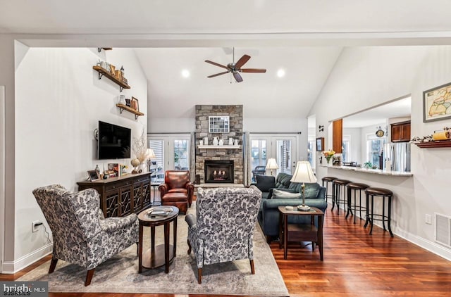 922 Central Ave, Hammonton, NJ 08037 - living room with lofted ceiling, wood finished floors, ceiling fan, baseboards, and a fireplace