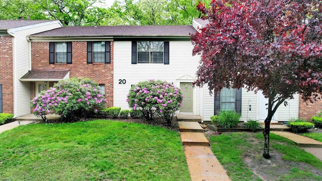 214 Mattix Run Unit 214, Galloway Township, NJ 08205 - view of front of property featuring a front yard, brick siding, and roof with shingles