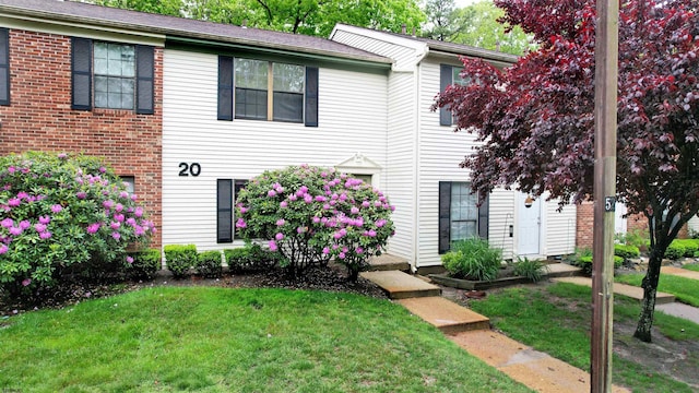 214 Mattix Run Unit 214, Galloway Township, NJ 08205 - view of front facade featuring a front yard and brick siding