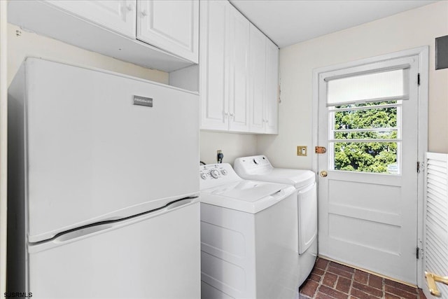 411 N Douglas Ave, Margate, NJ 08402 - laundry area featuring brick patterned floors, cabinet space, and washing machine and clothes dryer
