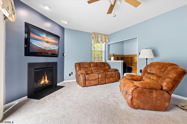 7 Mahogany Ct, Galloway Township, NJ 08205 - carpeted living room featuring a fireplace with flush hearth, ceiling fan, and baseboards