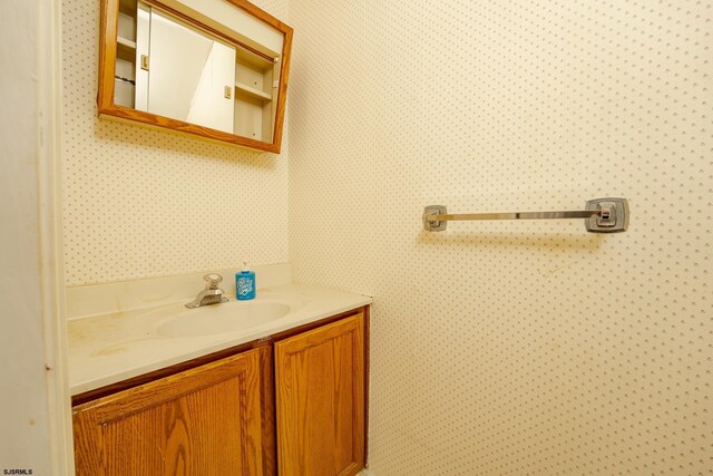 19 Clipper Ct, Atlantic City, NJ 08401 - bathroom featuring wallpapered walls and vanity