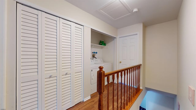 11 Cherokee Dr Unit 206, Galloway Township, NJ 08205 - corridor featuring independent washer and dryer, an upstairs landing, light wood-style flooring, and attic access