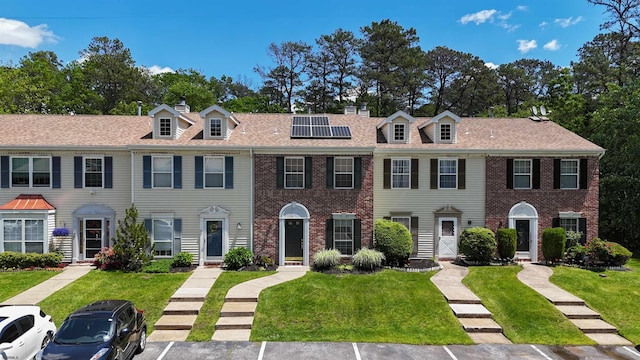 11 Cherokee Dr Unit 206, Galloway Township, NJ 08205 - multi unit property featuring solar panels, a front yard, and uncovered parking