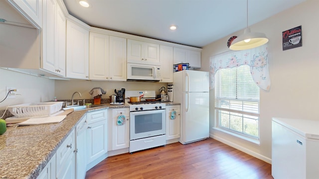 11 Cherokee Dr Unit 206, Galloway Township, NJ 08205 - kitchen featuring white appliances, white cabinetry, a sink, light wood finished floors, and recessed lighting