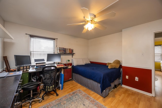 425 Central Ave Unit 1, Ocean City, NJ 08226 - bedroom with wood finished floors, a ceiling fan, a desk, and baseboards