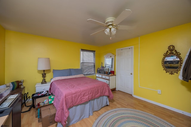 425 Central Ave Unit 1, Ocean City, NJ 08226 - bedroom featuring wood finished floors, a ceiling fan, and baseboards