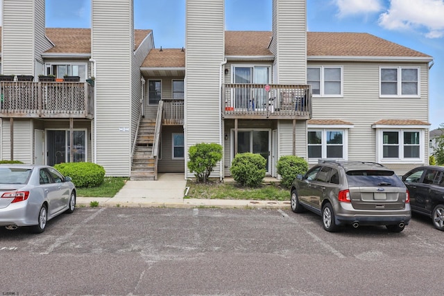 700 N Franklin Blvd Unit 1003, Pleasantville, NJ 08232 - view of property with uncovered parking and stairs