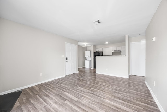 700 N Franklin Blvd Unit 1003, Pleasantville, NJ 08232 - unfurnished living room with wood finished floors and baseboards