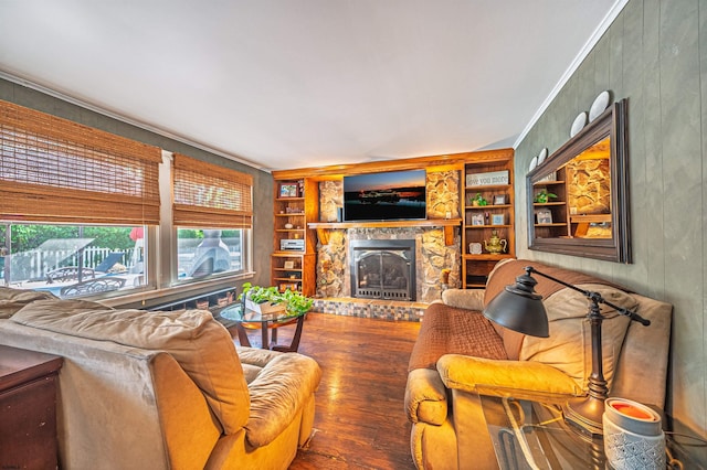 6 Holly Dr, Northfield, NJ 08225 - living area featuring wood finished floors, built in features, and a stone fireplace