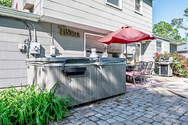 6 Holly Dr, Northfield, NJ 08225 - view of patio / terrace with a hot tub, area for grilling, and outdoor dining area