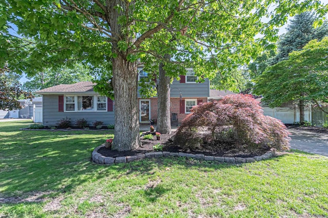 6 Holly Dr, Northfield, NJ 08225 - view of front of property featuring a front lawn, brick siding, and driveway