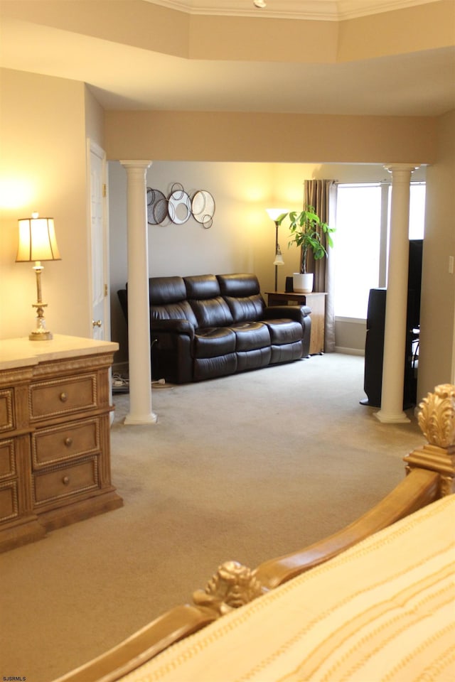 1599 Cherokee Ln, Vineland, NJ 08361 - living room featuring decorative columns, light colored carpet, and crown molding