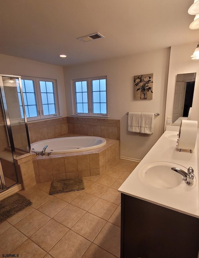 1599 Cherokee Ln, Vineland, NJ 08361 - full bath with tile patterned flooring, a garden tub, double vanity, and a shower stall