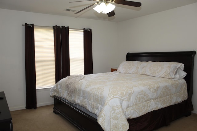 1599 Cherokee Ln, Vineland, NJ 08361 - bedroom featuring carpet, multiple windows, a ceiling fan, and baseboards