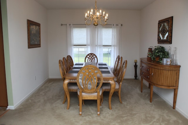 1599 Cherokee Ln, Vineland, NJ 08361 - dining area with a chandelier, light carpet, and baseboards