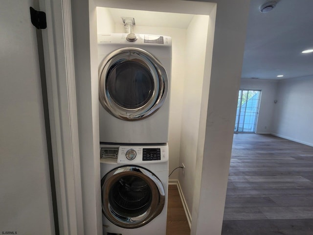 159 Heather Croft Unit 159, Egg Harbor Township, NJ 08234 - washroom with stacked washing machine and dryer, wood finished floors, baseboards, and recessed lighting