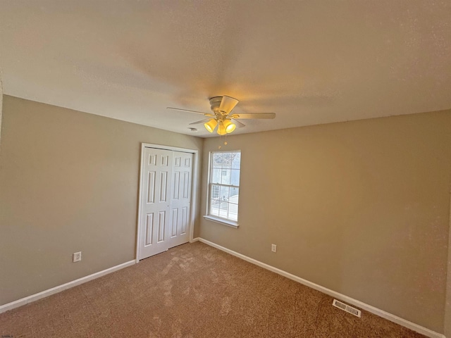 7 Nevis Dr, Egg Harbor Township, NJ 08234 - unfurnished bedroom featuring carpet floors, a closet, baseboards, and ceiling fan