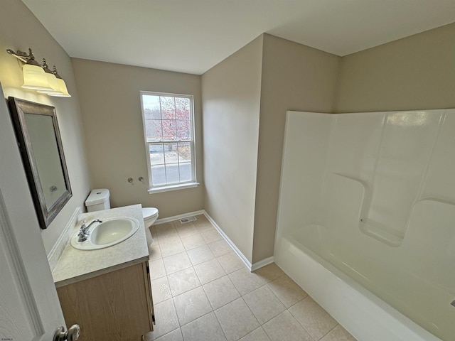 7 Nevis Dr, Egg Harbor Township, NJ 08234 - bathroom featuring toilet, tile patterned flooring, vanity, baseboards, and tub / shower combination