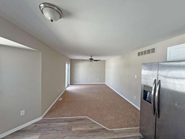 7 Nevis Dr, Egg Harbor Township, NJ 08234 - kitchen featuring stainless steel fridge, ceiling fan, baseboards, wood finished floors, and carpet flooring