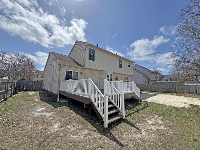 7 Nevis Dr, Egg Harbor Township, NJ 08234 - rear view of house featuring a wooden deck and a fenced backyard