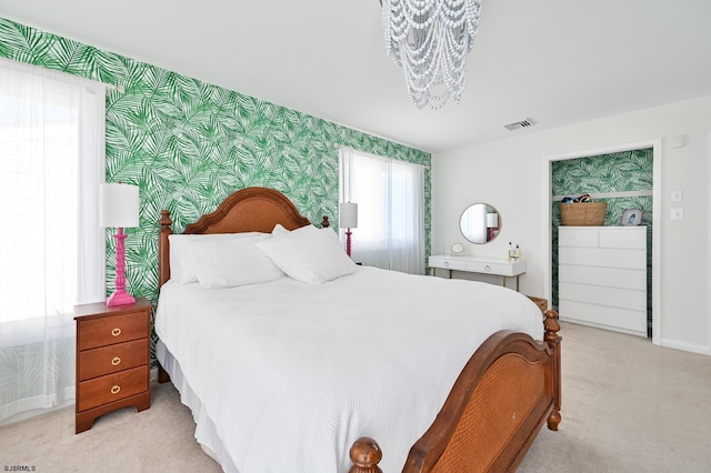 289 40th St Unit B, Brigantine, NJ 08203 - bedroom with wallpapered walls, light colored carpet, a chandelier, and baseboards
