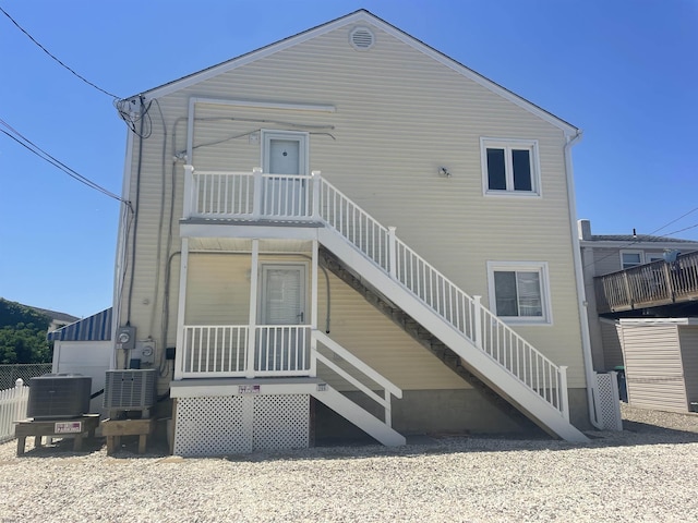 289 40th St Unit B, Brigantine, NJ 08203 - back of house with stairs and cooling unit