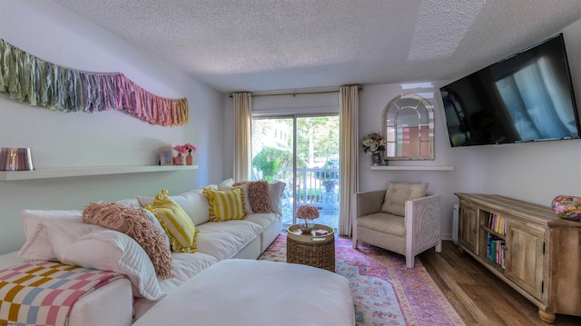 532B Sunrise Ave Unit 532B, Somers Point, NJ 08244 - living room with a textured ceiling and wood finished floors