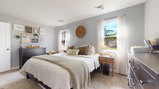 82 Robert Best Rd, Egg Harbor Township, NJ 08234 - bedroom featuring light carpet, multiple windows, and baseboards