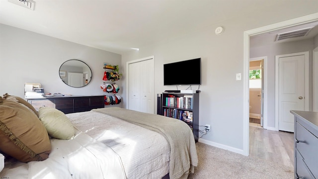 82 Robert Best Rd, Egg Harbor Township, NJ 08234 - bedroom with a closet, light carpet, and baseboards