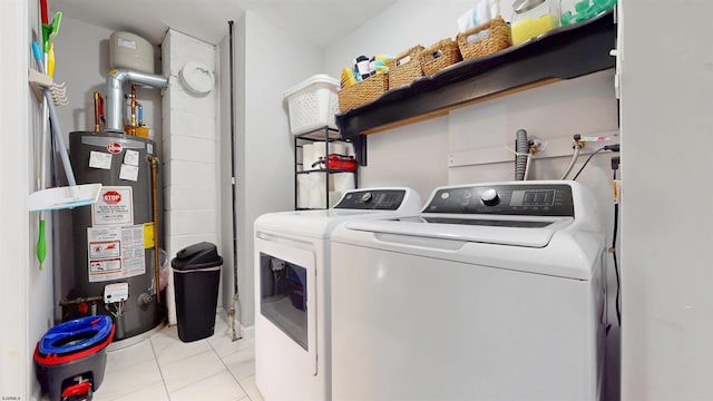 82 Robert Best Rd, Egg Harbor Township, NJ 08234 - washroom with washing machine and dryer, gas water heater, and light tile patterned floors