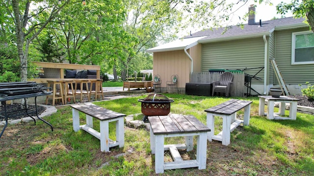 82 Robert Best Rd, Egg Harbor Township, NJ 08234 - view of grassy yard featuring a fire pit