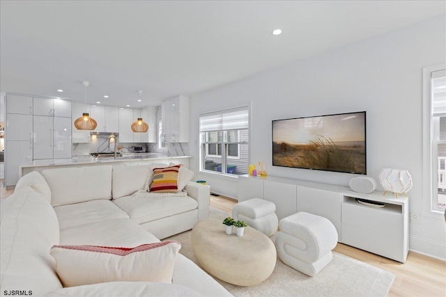 1A N Douglas Ave, Margate, NJ 08402 - living room with recessed lighting, light wood finished floors, and baseboards