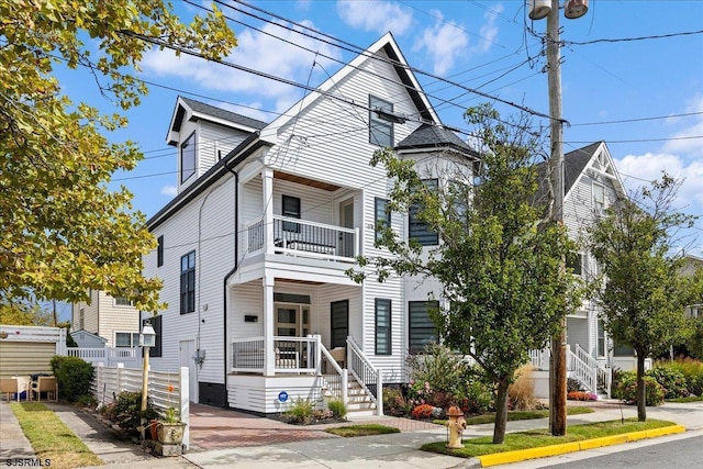 1A N Douglas Ave, Margate, NJ 08402 - view of front of house with a balcony and a porch
