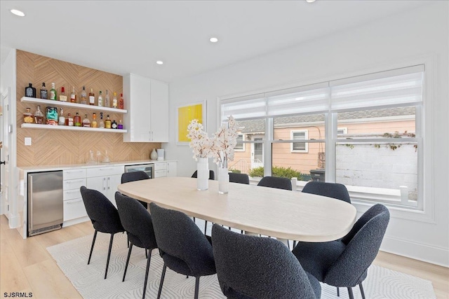 1A N Douglas Ave, Margate, NJ 08402 - dining area with wet bar, light wood-style floors, and recessed lighting