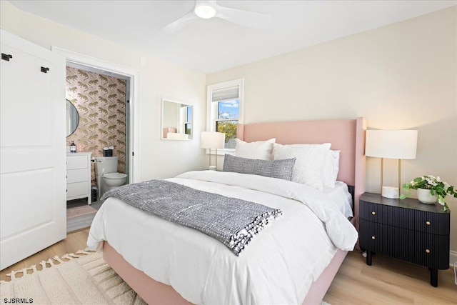 1A N Douglas Ave, Margate, NJ 08402 - bedroom with light wood finished floors, a ceiling fan, and ensuite bath