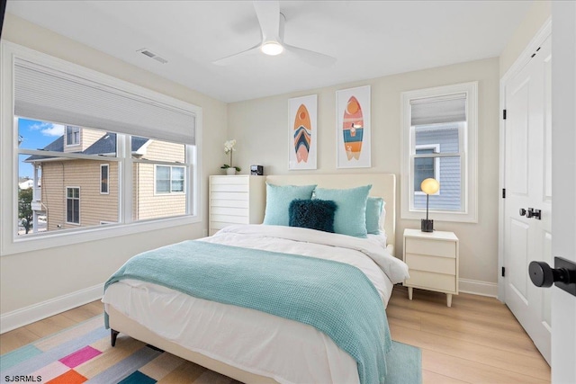 1A N Douglas Ave, Margate, NJ 08402 - bedroom featuring baseboards, wood finished floors, and ceiling fan