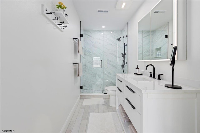 1A N Douglas Ave, Margate, NJ 08402 - bathroom featuring toilet, vanity, a marble finish shower, recessed lighting, and baseboards