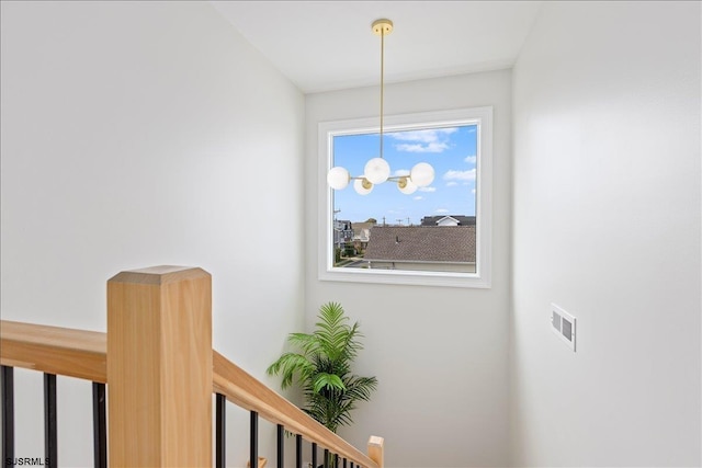 1A N Douglas Ave, Margate, NJ 08402 - staircase with a chandelier