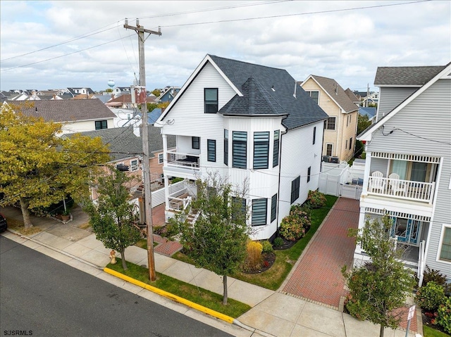 1A N Douglas Ave, Margate, NJ 08402 - view of front of property with a balcony, a residential view, and roof with shingles