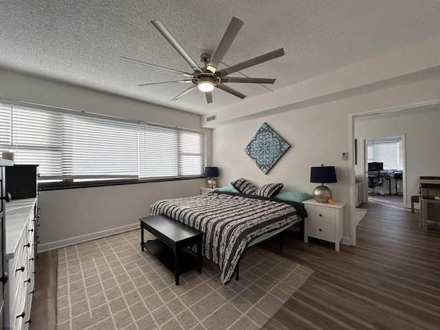 3101 Boardwalk Unit 1204-1, Atlantic City, NJ 08401 - bedroom featuring multiple windows, a textured ceiling, light wood finished floors, baseboards, and ceiling fan