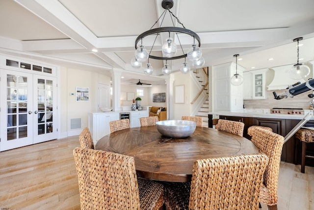 25 S Union Ave, Margate, NJ 08402 - dining space with decorative columns, stairs, light wood-type flooring, coffered ceiling, and beamed ceiling