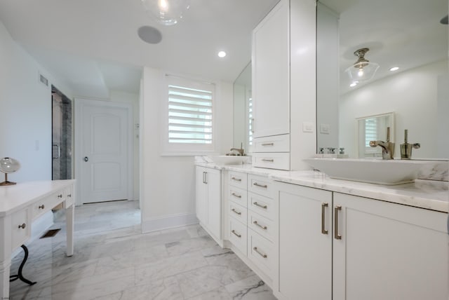 25 S Union Ave, Margate, NJ 08402 - bathroom featuring double vanity, plenty of natural light, marble look tiles, and recessed lighting