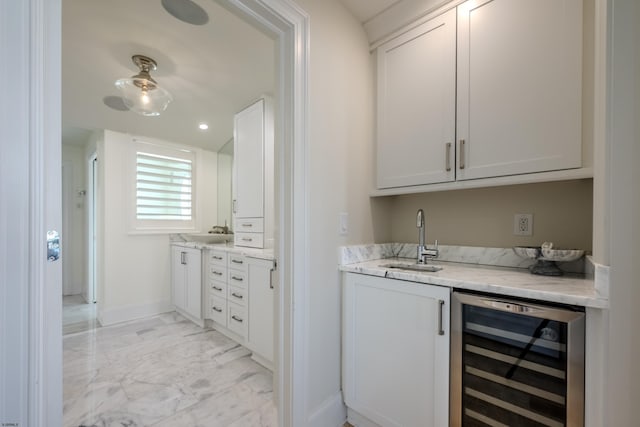 25 S Union Ave, Margate, NJ 08402 - indoor bar with wine cooler, light marble finish floors, and baseboards