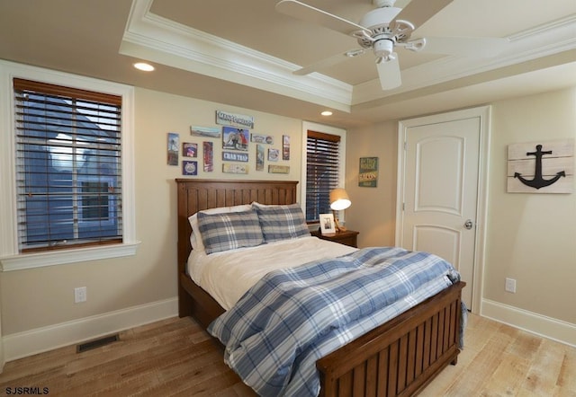 25 S Union Ave, Margate, NJ 08402 - bedroom featuring crown molding, recessed lighting, a raised ceiling, baseboards, and light wood-type flooring