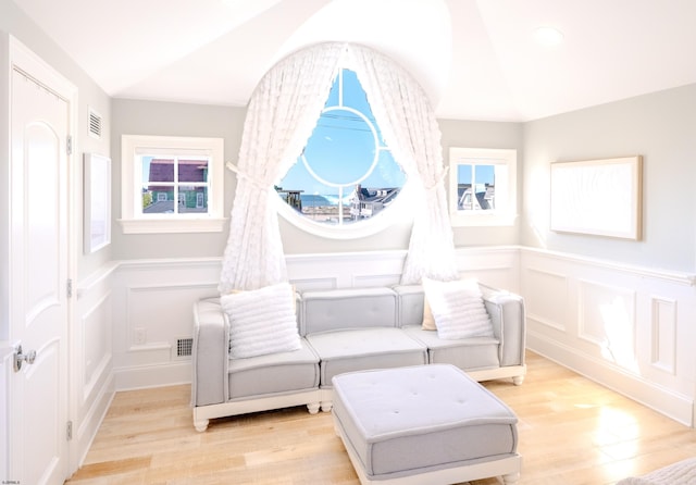 25 S Union Ave, Margate, NJ 08402 - sitting room with a decorative wall, light wood-style flooring, a wainscoted wall, vaulted ceiling, and recessed lighting